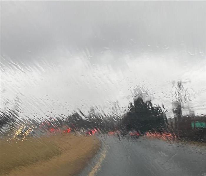 rainy, stormy view from car windshield