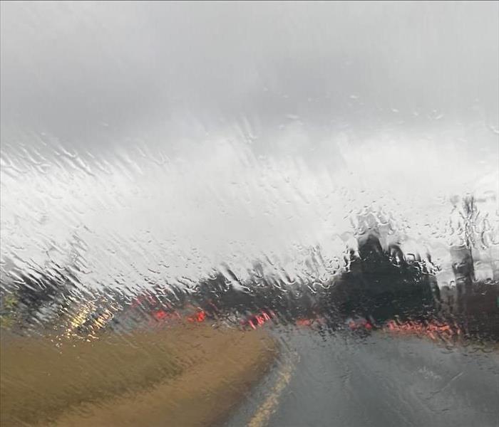 rainy, stormy view from car windshield