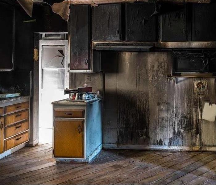 fire damage and soot in kitchen