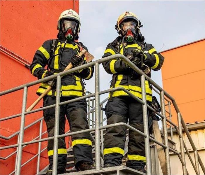 two firefighters