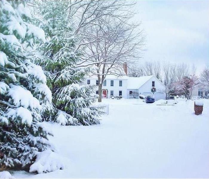 Snow surrounding a property